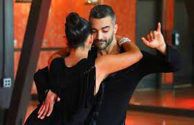 Elite Bachata dancers performing sensual choreography